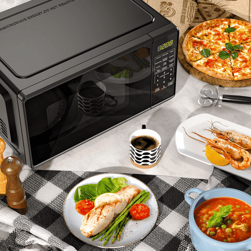 Mainstays 0.7 Cu ft Countertop Microwave Oven, 700 Watts, Black, New